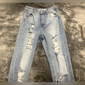Ripped light wash jeans in the size 5